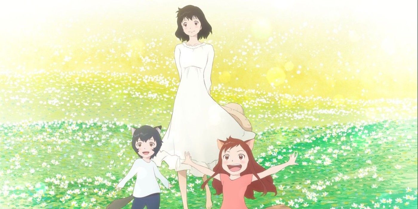 The family from Wolf Children frolics in the flowers.